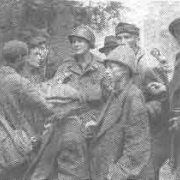© American‐Israeli Cooperative Enterprise Liberators with survivors, May 1945