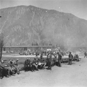 © USHMM Liberated prisoners on the former roll call square, May 1945